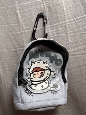 Hirono Light Gray Canvas Frog Pouch with Black Carabiner Bag Charm.